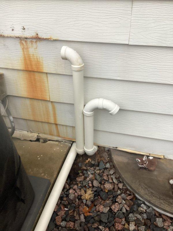 Completed scheduled preventative maintenance agreement service on customer's HVAC system. Inspected furnace components including control board, motor, wiring connections, and drainage system. Noted rust staining on exterior PVC vent pipes requiring future attention.