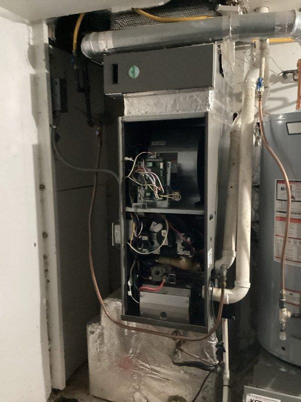 Performed scheduled maintenance agreement tune-up on furnace system. Conducted combustion analysis with diagnostic tool to verify proper operation parameters including CO/CO2 levels. Inspected internal components with access panel removed; all connections, wiring, and control board functioning normally. Unit was operational with no reported issues at time of service.