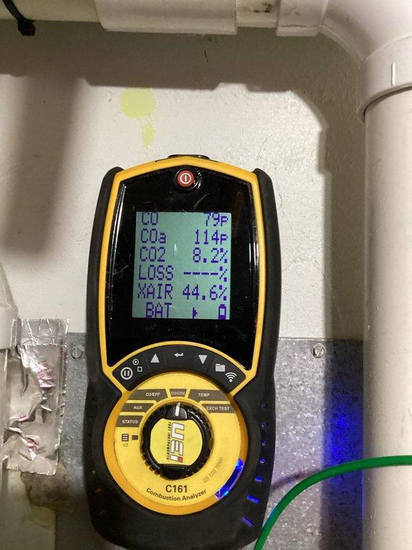 Completed scheduled furnace preventative maintenance agreement service. Performed combustion analysis using UEi C161 analyzer, which indicated system operating at 8.2% CO2 with 44.6% excess air at normal temperatures. Inspected exterior condensate drain line and gas connections; all components functioning properly.