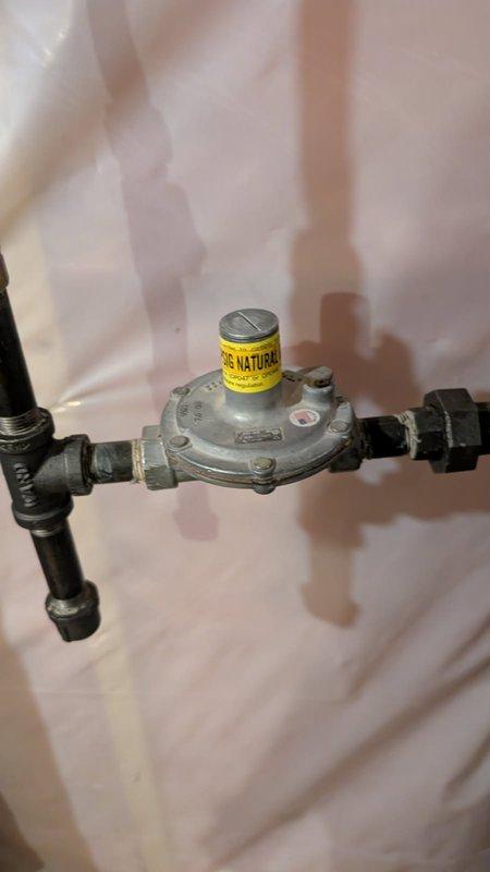 Responded to service call regarding reported gas pressure issues. Upon inspection, verified all gas appliances were functioning with adequate pressure despite fireplace cleaning company's concerns. Visual inspection of gas regulator and piping system showed normal installation with no visible leaks or deterioration. Demonstrated to customer that gas pressure was maintaining properly throughout the system and all gas appliances were operating as intended.