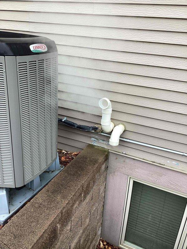 Performed scheduled preventative maintenance agreement service on residential furnace system during 8-12 arrival window as arranged with customer. Completed comprehensive inspection and maintenance of Lennox heating system, including filter replacement. Also examined the outdoor AC condenser unit which was properly mounted on concrete block wall with adequate drainage setup.