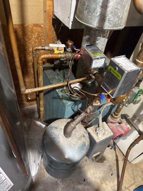 Responded to service call to replace malfunctioning zone valve on residential boiler system. Successfully removed deteriorated valve and installed new replacement zone valve on copper distribution piping connected to the expansion tank. System tested and confirmed proper operation after 3-hour service completion.