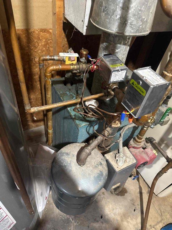 Responded to service call to replace malfunctioning zone valve on residential boiler system. Successfully removed deteriorated valve and installed new replacement zone valve on copper distribution piping connected to the expansion tank. System tested and confirmed proper operation after 3-hour service completion.
