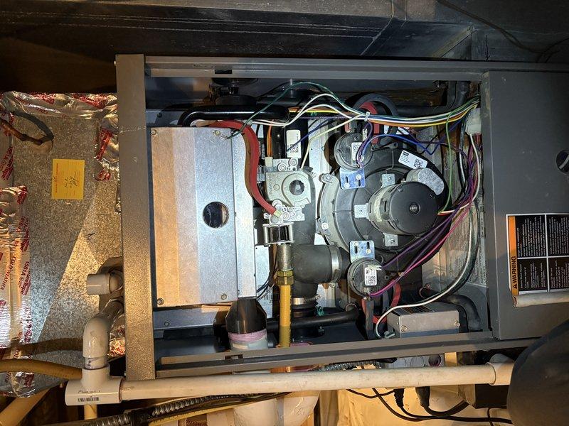 Performed diagnostic assessment on HVAC system where client reported temperature inconsistency between floors (81°F family room, 68°F upstairs). Inspection of furnace components and ductwork confirmed single-zone configuration with inadequate temperature balancing capabilities. Recommended installation of zoning system to allow independent temperature control for upstairs area.