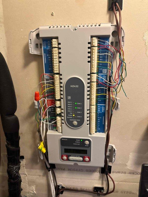 Responded to heat pump service call and discovered incorrect outdoor temperature sensor (ODT) wiring. Made necessary corrections to the ODT connections and reconfigured Honeywell HZ432 zone controller settings on thermostats to ensure proper system operation across all zones.