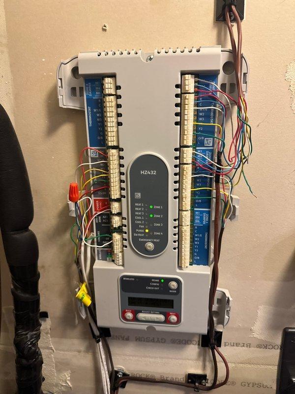 Responded to heat pump service call and discovered incorrect outdoor temperature sensor (ODT) wiring. Made necessary corrections to the ODT connections and reconfigured Honeywell HZ432 zone controller settings on thermostats to ensure proper system operation across all zones.