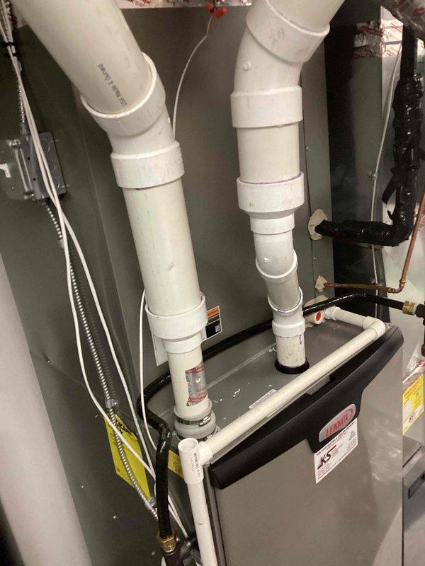 Performed scheduled preventative maintenance tune-up on York HVAC system. Inspected furnace unit, condensate drain lines, and ventilation components. All systems functioning properly with no issues identified.