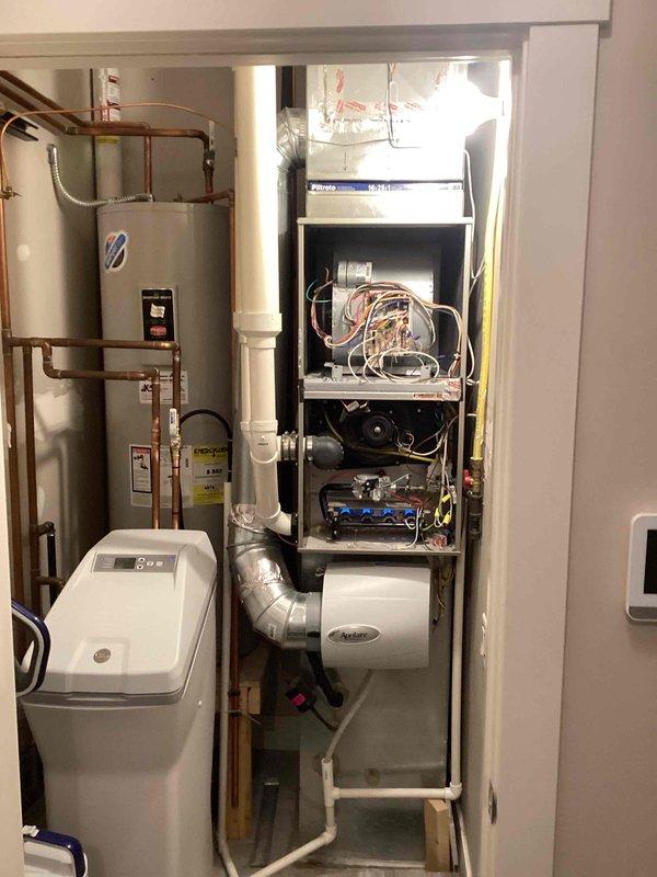 Performed seasonal tune-up on customer's HVAC system. Inspected furnace components, checked electrical connections, and verified proper system operation. System functioning normally with no issues identified.