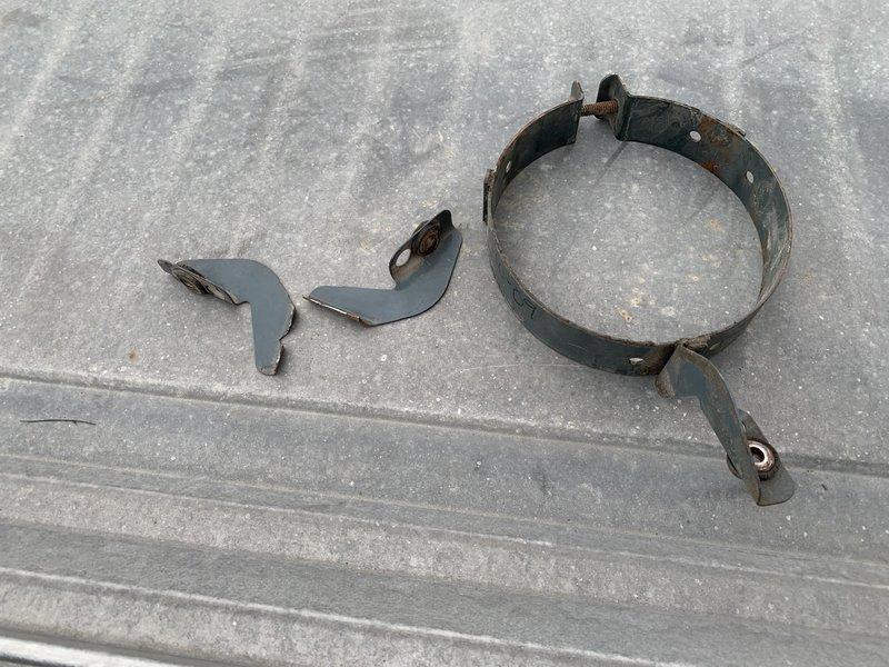 Responded to no heat call for two RTU furnaces where one unit had failed completely. Diagnostic inspection revealed broken motor mount and damaged blower wheel assembly, evidenced by system debris collection and fractured metal strapping. Replaced motor mount and blower wheel components to restore proper system operation. Unit successfully returned to service after repair.