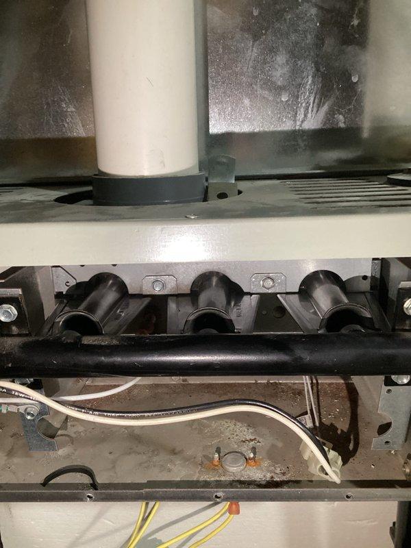 Responded to no-heat call for gas furnace that had been cycling off repeatedly. Diagnostic testing with UEi C161 Combustion Analyzer revealed combustion issues (CO2 at 4.1%, 12.8% efficiency loss). Inspection found deteriorated burners causing improper flame pattern and heat exchanger operation. Replaced defective burners and verified proper combustion and system operation before departure.