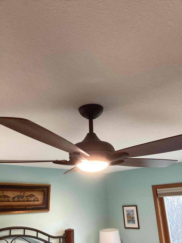 Responded to service call for non-operational ceiling fan. Diagnosed issue as faulty receiver. Successfully installed customer-supplied replacement receiver, restoring full functionality to the fan and light fixture.