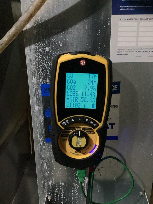 Performed comprehensive air handler tune-up including filter inspection and replacement. Conducted combustion analysis showing CO2 at 7.3%, system loss at 11.4%, and excess air at 50.5%. Diagnosed and adjusted thermostat settings to ensure proper system functionality before completing required rebate documentation.