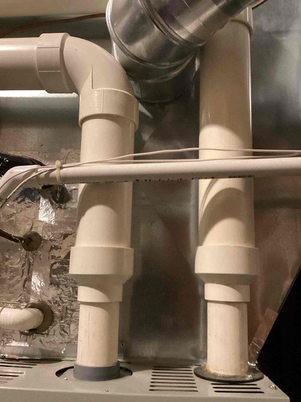 Performed standard tune-up maintenance on an air handler system with visual inspection of furnace unit and associated PVC exhaust ventilation. Inspected internal components including control board, wiring connections, and mechanical parts while system panel was removed. All systems functioning normally; no issues identified during service.