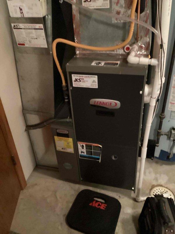 Performed scheduled maintenance tune-up on customer's Lennox HVAC system. Inspected furnace components, connections, and ventilation system including PVC piping and ductwork. Completed comprehensive system evaluation with no issues detected; unit is operating according to manufacturer specifications.