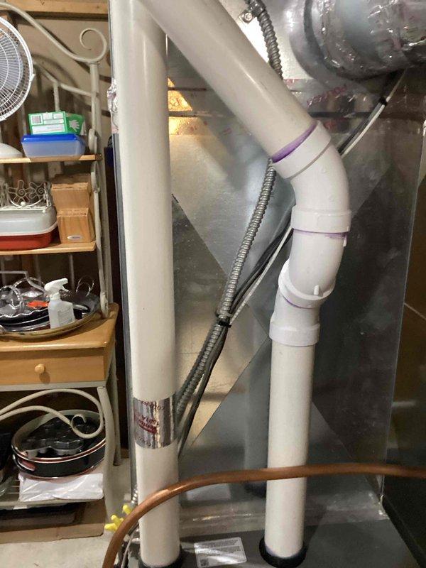 Performed scheduled preventative maintenance on air handler as part of maintenance agreement. Reattached loose kitchen under-cabinet vent with proper fasteners. Replaced water panel in humidifier and completed full system tune-up with no additional issues identified.