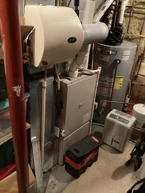 Arrived at 12:04 for scheduled furnace preventative maintenance agreement service. Performed comprehensive inspection of air handler unit in basement mechanical room, including combustion analysis testing. Diagnostic readings showed proper CO levels (19P), CO2 concentration (6.3%), and excess air ratio (87.5%), confirming system is operating within specifications.