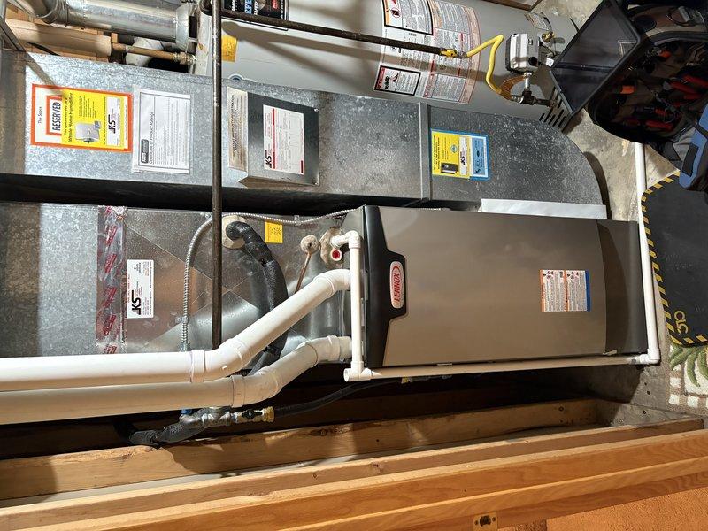 Responded to emergency gas odor call. Upon inspection, identified gas leak at bottom flex line connection of Lennox furnace system. Removed failed connection, reapplied appropriate sealant at brass fitting junction, reconnected gas line, and performed leak testing to verify repair was successful and system now operating safely.