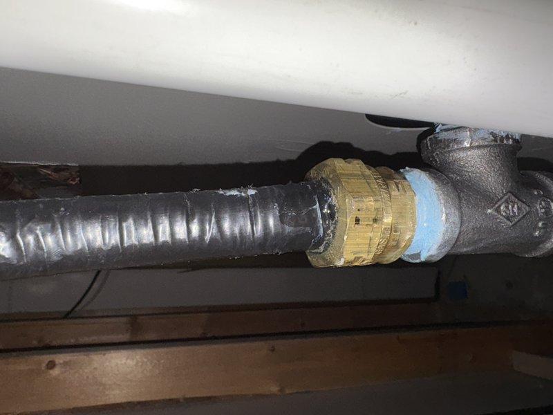Responded to emergency gas odor call. Upon inspection, identified gas leak at bottom flex line connection of Lennox furnace system. Removed failed connection, reapplied appropriate sealant at brass fitting junction, reconnected gas line, and performed leak testing to verify repair was successful and system now operating safely.