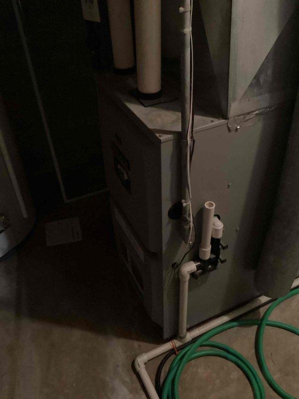 Responded to no-heat call and diagnosed dual system failures: faulty collector box and failing inducer motor bearings. Implemented temporary repair to collector box to restore heat functionality. Documented existing furnace condition with photos and provided customer with repair options and replacement system estimate.