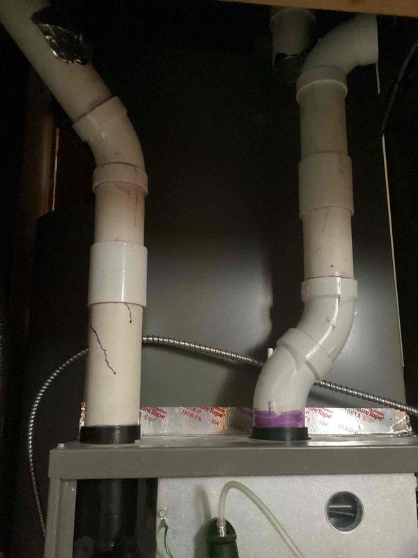 Performed scheduled preventative maintenance agreement service on air handler system during 8-12 time window. Completed comprehensive tune-up with no issues identified. Inspected condensate drain lines for proper function; both PVC drain pipes appear structurally sound with appropriate connections to the unit.