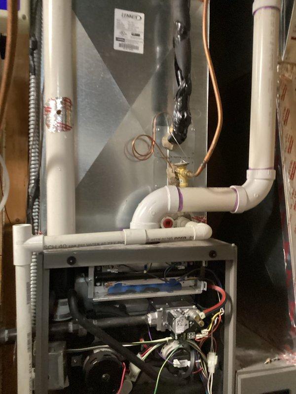 Performed scheduled maintenance tune-up on residential furnace unit with on-time arrival during 8-12 window. Inspected system components including blower motor, circuit board connections, and PVC ventilation piping. All systems functioning properly; no issues found.