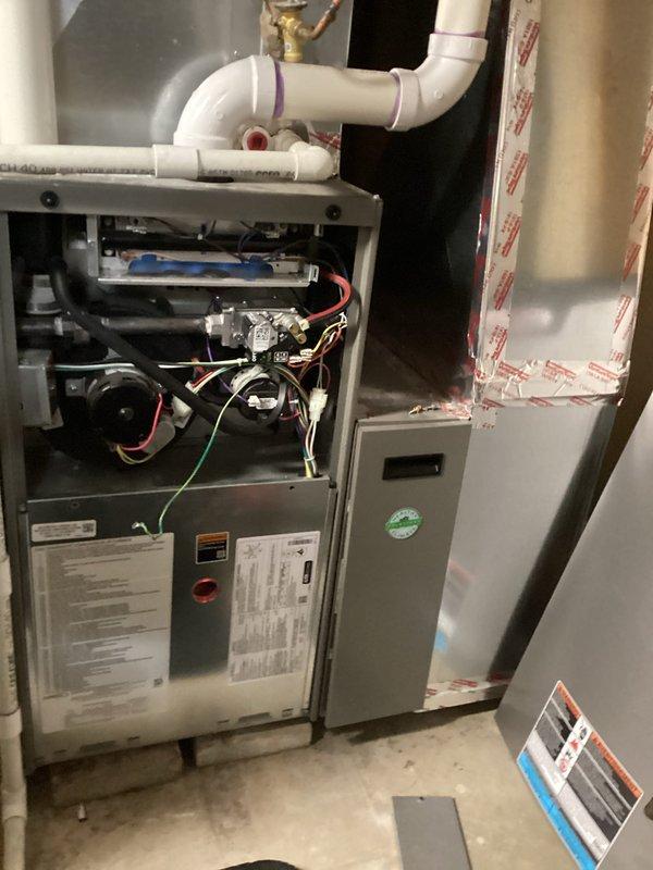 Performed scheduled maintenance tune-up on residential furnace unit with on-time arrival during 8-12 window. Inspected system components including blower motor, circuit board connections, and PVC ventilation piping. All systems functioning properly; no issues found.