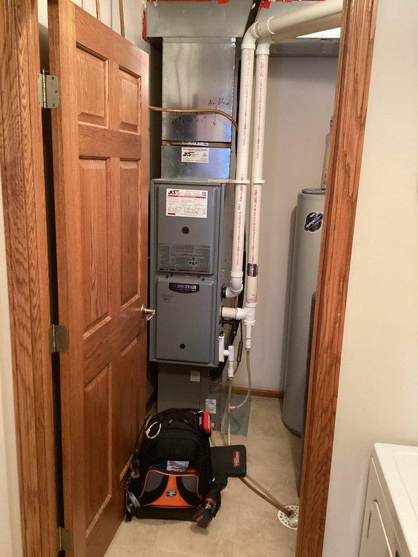 Performed scheduled furnace preventive maintenance agreement on Tempstar heating system. Inspected furnace components, verified proper operation, and confirmed system readiness for the heating season. Unit is a Tempstar SmartComfort model located in utility closet alongside water heater with all connections in good working condition.
