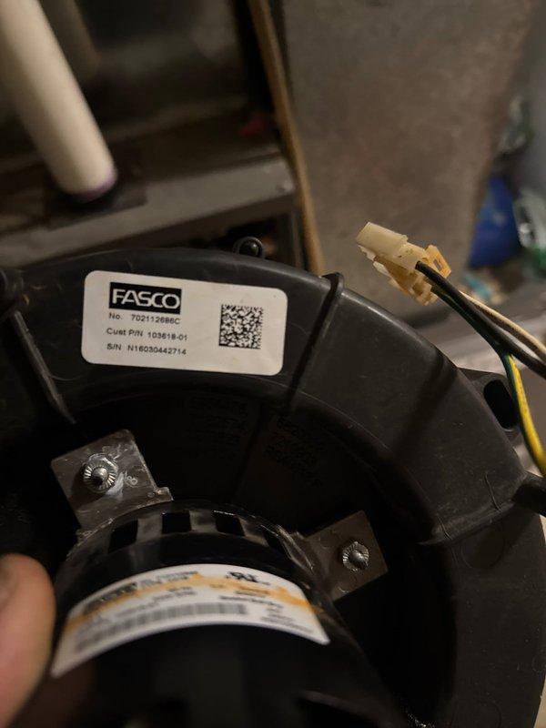 Responded to no heat call for furnace making loud noise. Diagnostic inspection revealed failed inducer motor, evident from 2017 installation with no maintenance history. Removed and replaced Fasco inducer motor assembly (PN: 70211288BC), restored proper flame and system operation. Unit is now functioning correctly.