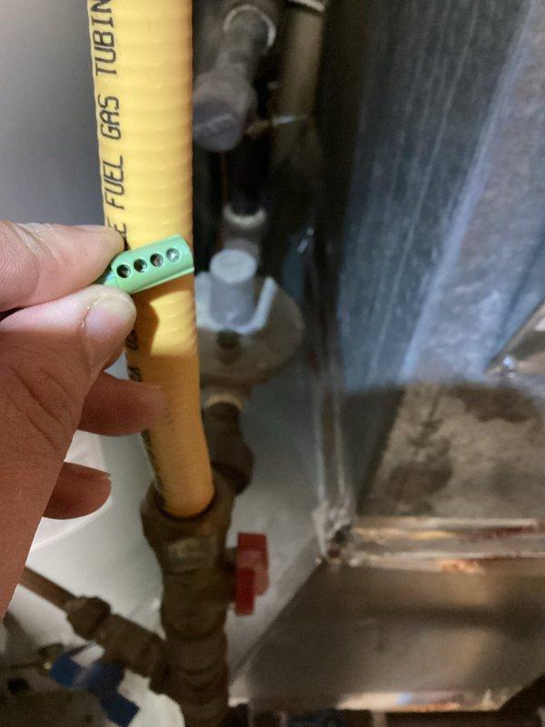 Responded to commercial no heat call. Diagnosed restricted exhaust system, likely due to bird nest obstruction. Successfully cleared blockage by blowing through exhaust pipe, restoring proper furnace operation. Inspected gas line connections and gasket during service.