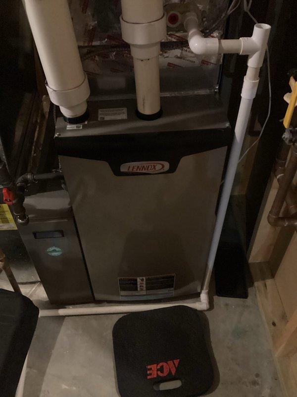 Performed scheduled maintenance tune-up on Lennox furnace unit per agreement. System was functioning properly with no issues found. Completed full inspection of heating components, connections, and drainage system with all components operating within normal parameters.