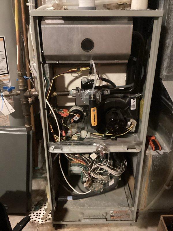 Performed scheduled maintenance agreement tune-up on residential HVAC system. Inspected furnace components including blower motor, control boards, gas valve assembly, and PVC ventilation pipes. All systems functioning properly; no issues identified.