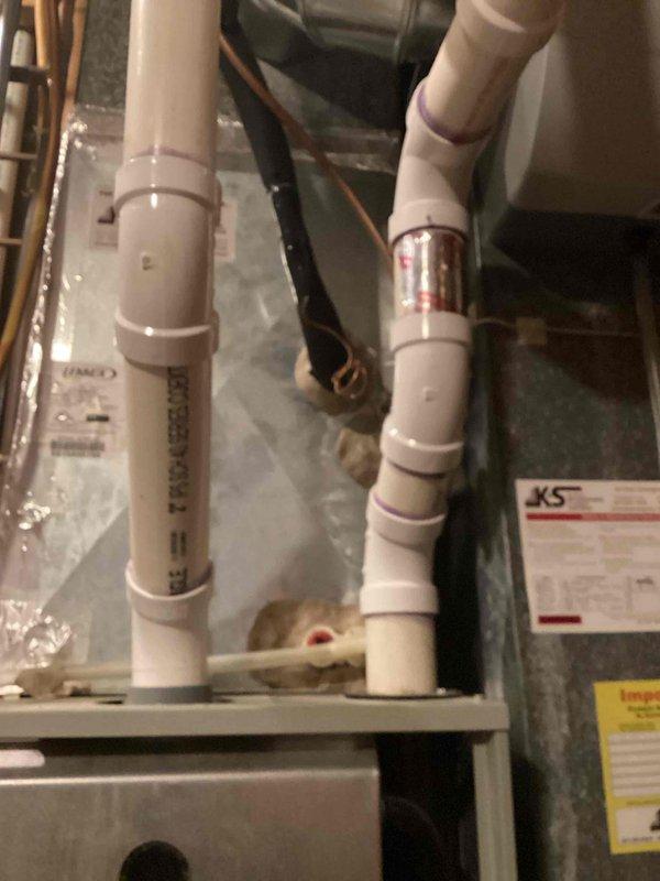 Performed scheduled maintenance agreement tune-up on residential HVAC system. Inspected furnace components including blower motor, control boards, gas valve assembly, and PVC ventilation pipes. All systems functioning properly; no issues identified.