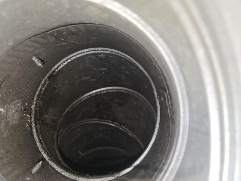 Completed comprehensive duct cleaning service that was included with system installation. Removed accumulated dust and debris from the HVAC ductwork system, thoroughly cleaning all vents to improve system efficiency and air quality. Visual inspection confirmed successful removal of contaminants from circular metal ducts.