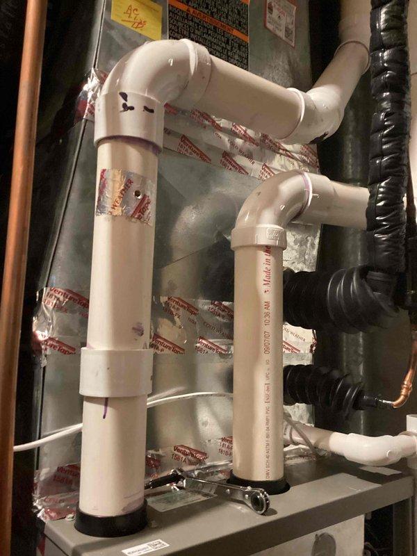 Performed scheduled preventative maintenance agreement service on air handler system. Completed comprehensive tune-up with no issues identified. Inspected condensate drain configuration and verified proper PVC piping installation with appropriate elbows and connections.