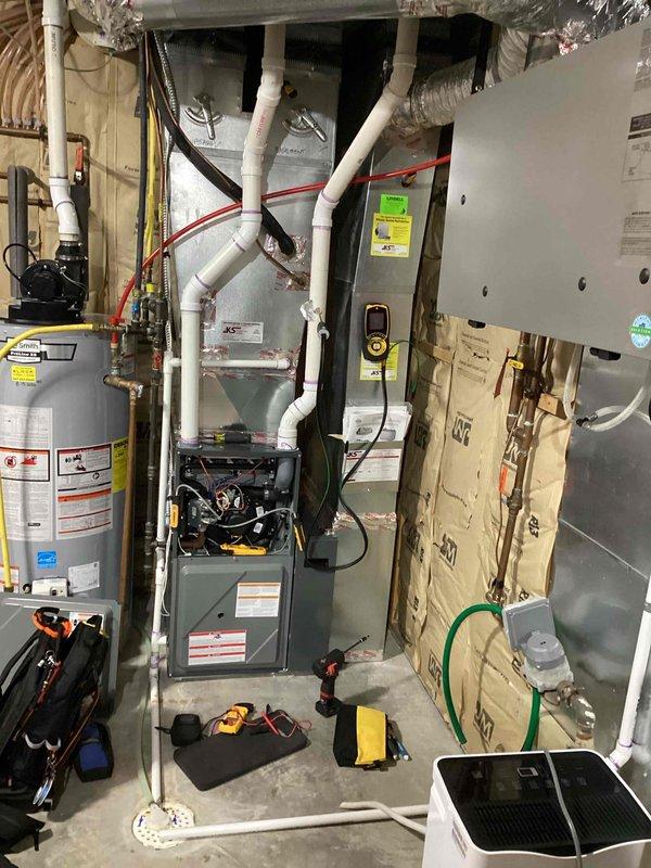 Performed scheduled preventative maintenance on residential furnace system. Completed comprehensive inspection of the heating unit, associated PVC ventilation/drainage components, and control systems. All equipment appears functional with no visible damage or deterioration noted.