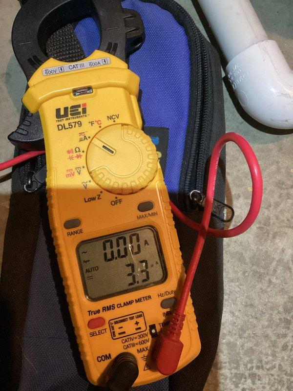 Responded to no heat complaint on furnace less than 10 years old. Diagnosed dirty flame sensor preventing proper ignition. Service included cleaning the flame sensor, verifying proper microamp readings with UEi DL579 meter, and confirming inducer motor performance by measuring water column pressure. System restored to normal operation.