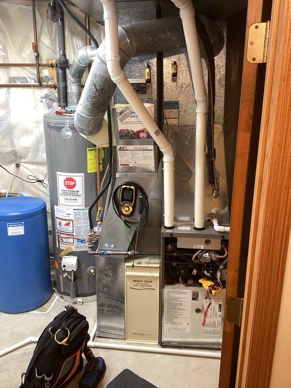 Performed scheduled maintenance on basement and garage furnaces as part of prepaid maintenance agreement. Identified significant rust damage on basement furnace and diagnosed error code A350. Found faulty humidifier with water leaking from solenoid valve. Customer advised to call immediately regarding humidifier repair options.
