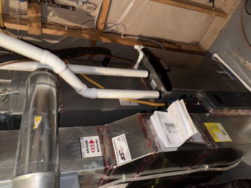 Performed service on newly installed HVAC system with no heat complaint. Diagnosed issue as recirculating exhaust gases due to improper venting configuration. Corrected the venting system to ensure proper exhaust discharge, resolving the no-heat condition and preventing potential safety hazards.