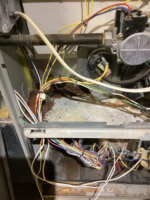 Responded to no-heat call for 20-year-old furnace that stopped operating overnight. Diagnostic testing revealed failed control board as root cause. Due to the unit's age and overall condition (visible corrosion, disorganized wiring, and component wear), replacement was recommended to restore reliable heating function.