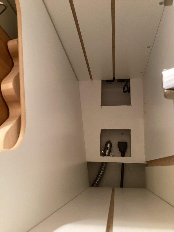 Diagnosed and replaced faulty LED drivers powering kitchen puck lights after customer's bulb replacement attempts failed to restore function. Accessed power supply components through cabinet access panel, installed new compatible drivers, and confirmed proper operation of all kitchen cabinet lighting fixtures.