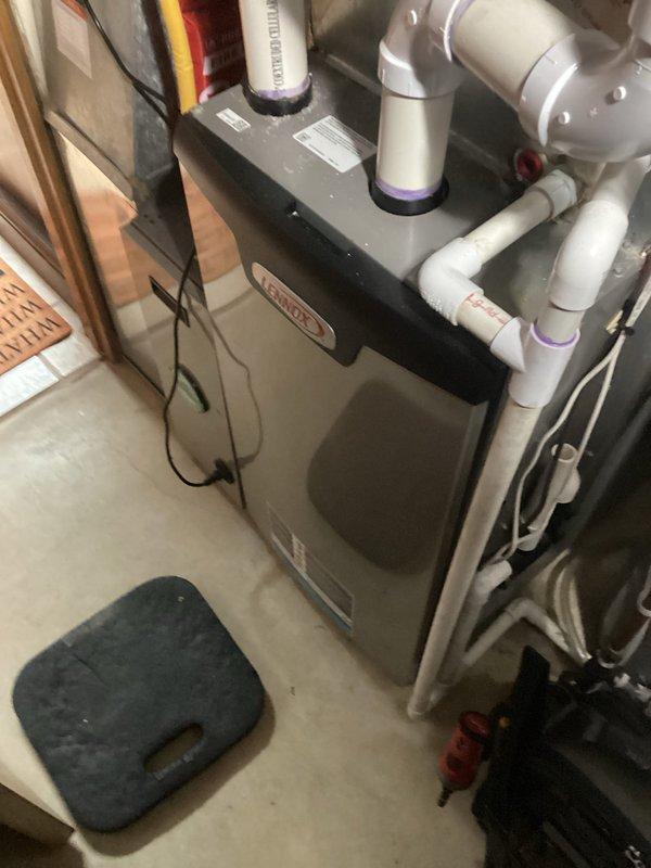 Performed scheduled tune-up on Lennox furnace and discovered cracked heat exchanger. Red-tagged unit due to safety hazard and discussed replacement options with customer, who agreed to proceed with heat exchanger replacement. Inspection included verification of proper venting configuration and connection integrity of the plumbing components.