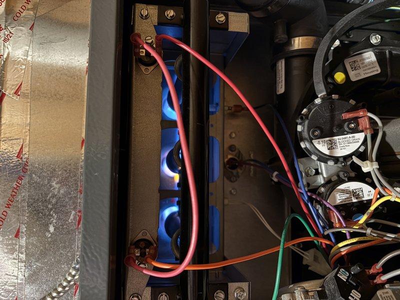 Responded to emergency no heat call. Diagnostic inspection revealed furnace fan was operating but flame was not staying lit. Visual inspection of gas burner assembly showed flame sensor had carbon buildup causing improper flame detection. Cleaned flame sensor thoroughly, tested system operation with multiple heating cycles. Unit now functioning properly with consistent flame ignition and proper heat distribution.