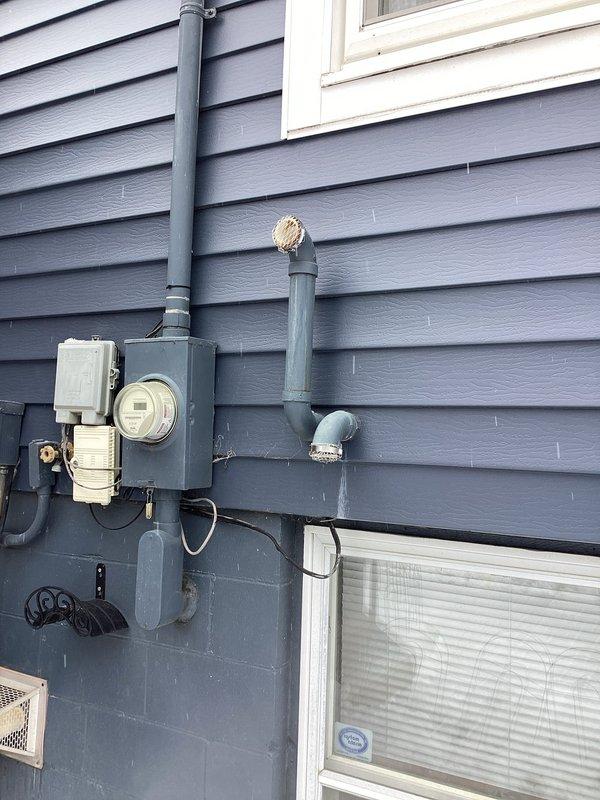 Responded to emergency no-heat call for 10+ year old furnace that had stopped operating. Diagnosed system failure caused by dirty flame rod preventing proper ignition. Performed flame rod cleaning, which resolved the issue and restored normal furnace operation. Also noted moisture intrusion from incorrectly oriented exterior exhaust vent, which was causing water to leak from PVC pipe into furnace.