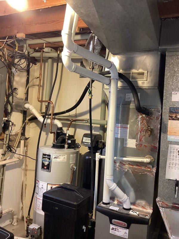 Responded to emergency no-heat call for 10+ year old furnace that had stopped operating. Diagnosed system failure caused by dirty flame rod preventing proper ignition. Performed flame rod cleaning, which resolved the issue and restored normal furnace operation. Also noted moisture intrusion from incorrectly oriented exterior exhaust vent, which was causing water to leak from PVC pipe into furnace.