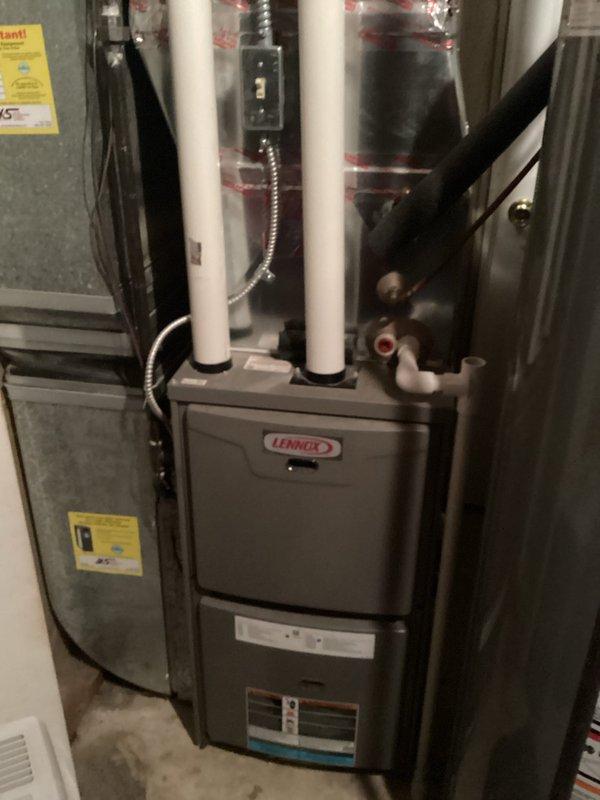 Performed annual tune-up service on a Lennox residential furnace system. Completed comprehensive inspection of unit including electrical connections, venting system (PVC intake/exhaust), and associated ductwork. All components were tested and verified to be functioning within normal parameters; no issues requiring additional service were identified.