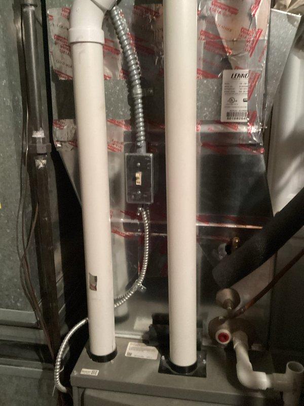 Performed annual tune-up service on a Lennox residential furnace system. Completed comprehensive inspection of unit including electrical connections, venting system (PVC intake/exhaust), and associated ductwork. All components were tested and verified to be functioning within normal parameters; no issues requiring additional service were identified.