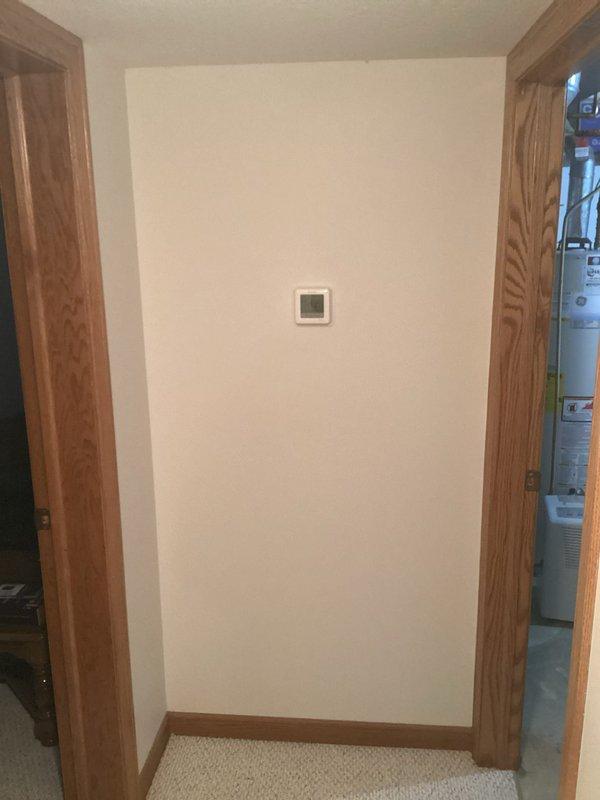 Responded to emergency no-heat call for 7-year-old furnace system in basement zone of two-zone system. Inspected thermostat location in hallway and verified damper operation, confirming proper airflow to basement. Determined issue was temperature differential between rooms with windows cooling faster than the hallway where thermostat is located rather than equipment malfunction.