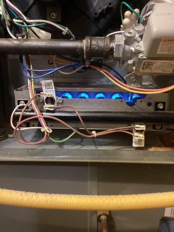 Responded to emergency no-heat call and diagnosed failed pressure switch in aging furnace. Replaced defective pressure switch, verified proper flame pattern and draft motor operation, and restored normal heating function.