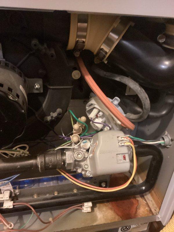 Responded to emergency no-heat call and diagnosed failed pressure switch in aging furnace. Replaced defective pressure switch, verified proper flame pattern and draft motor operation, and restored normal heating function.