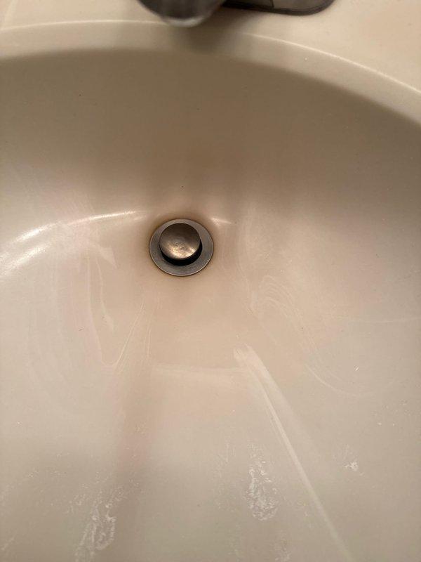 Responded to water leak service call to address multiple issues. Repaired leaking condensate on furnace by tightening hose clamps on inducer. Replaced tub and lavatory pop-up drains which showed significant buildup and wear. Provided customer with estimate for additional plumbing repairs including replacement of stoppers.